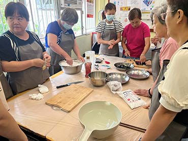 Participants learn to make Cantonese style dumplings. 1