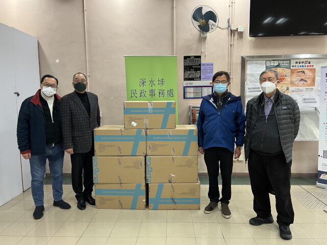 Sham Shui Po District Office distribute rapid test kits donated by the Toi Shan Association