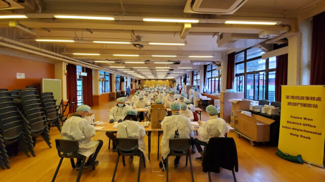 Tsuen Wan District Office together with local organisations pack COVID-19 rapid test kits1