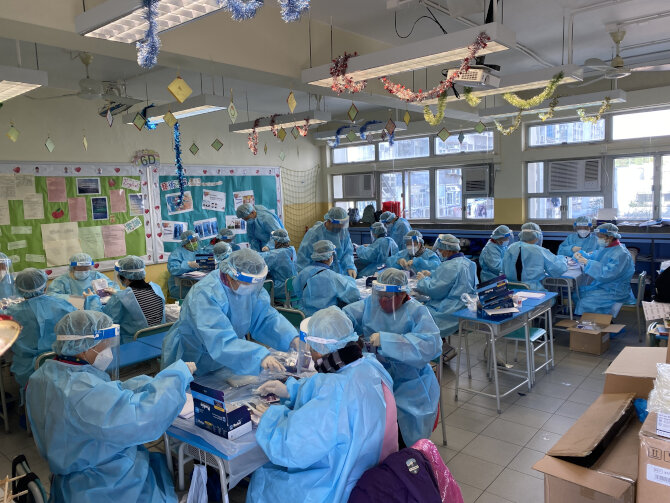Yuen Long District Office mobilises volunteers to pack rapid antigen test kits1