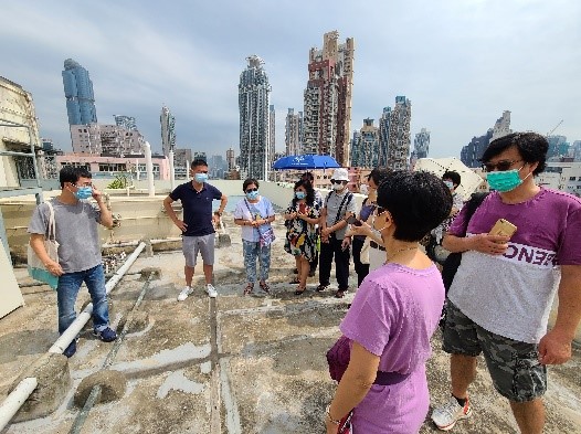 Participants are briefed on the fire safety improvement works at the rooftop
